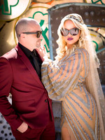 Couple photographed among vintage neon signs at the Neon Museum in Las Vegas
