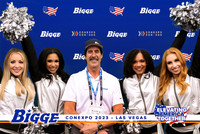 Guests posing on a red carpet in front of a step and repeat backdrop in Las Vegas