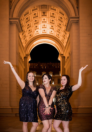Friends posing together during a bachelorette photo shoot on the Las Vegas Strip