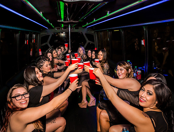 Friends posing together during a bachelorette photo shoot on the Las Vegas Strip