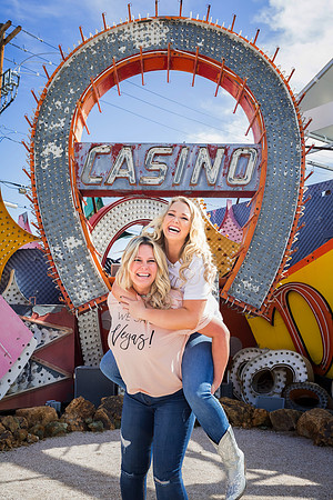 Friends posing together during a bachelorette photo shoot on the Las Vegas Strip