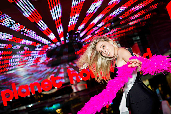 Friends posing together during a bachelorette photo shoot on the Las Vegas Strip