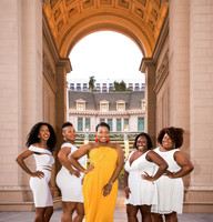 Friends posing together during a bachelorette photo shoot on the Las Vegas Strip