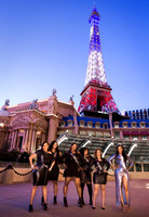 Friends posing together during a bachelorette photo shoot on the Las Vegas Strip