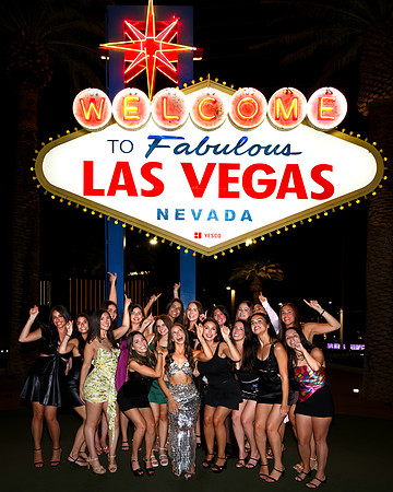 Friends posing together during a bachelorette photo shoot on the Las Vegas Strip