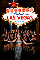 Friends posing together during a bachelorette photo shoot on the Las Vegas Strip