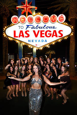 Friends posing together during a bachelorette photo shoot on the Las Vegas Strip